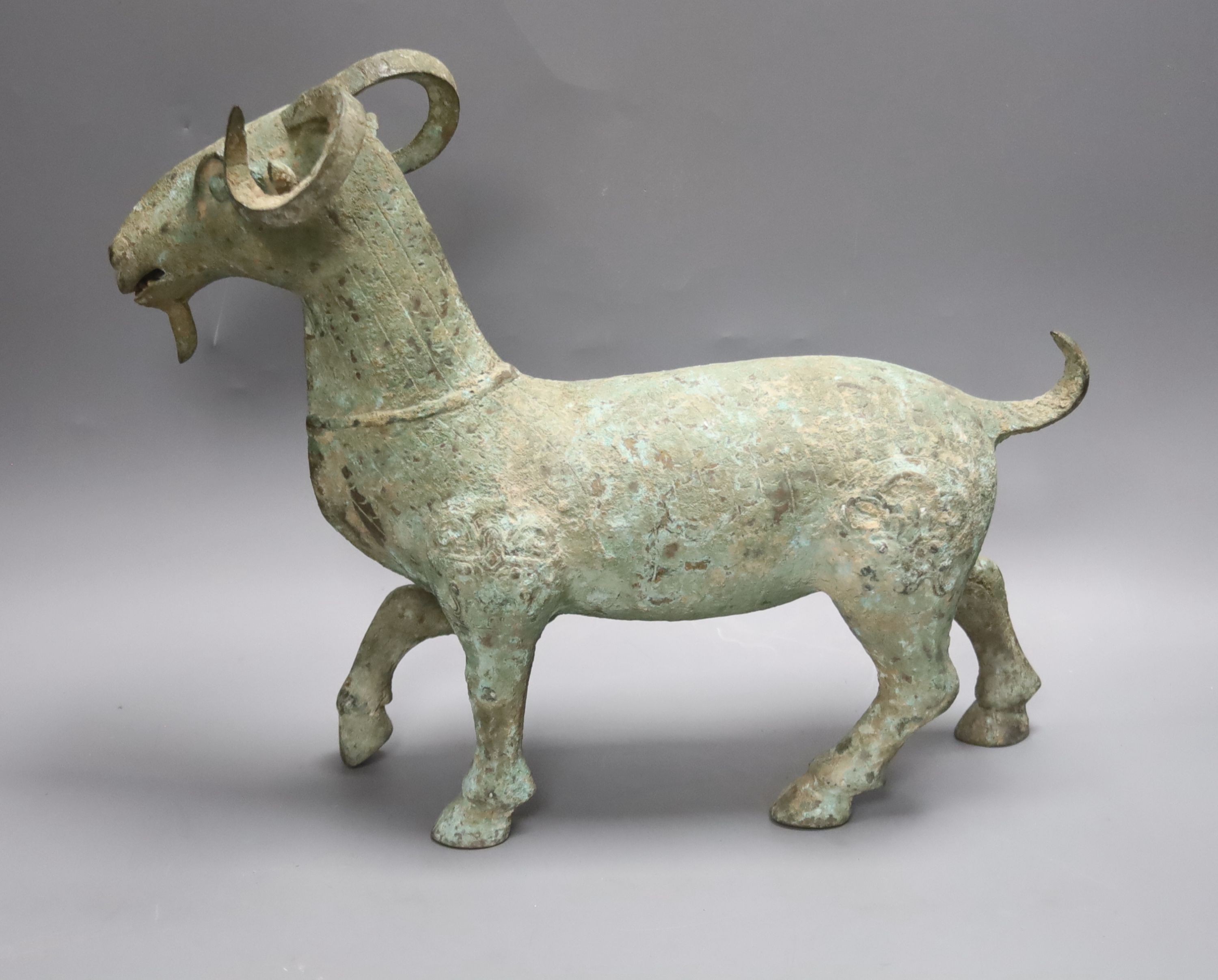 A large Chinese bronze ram, width 36cm height 30cm